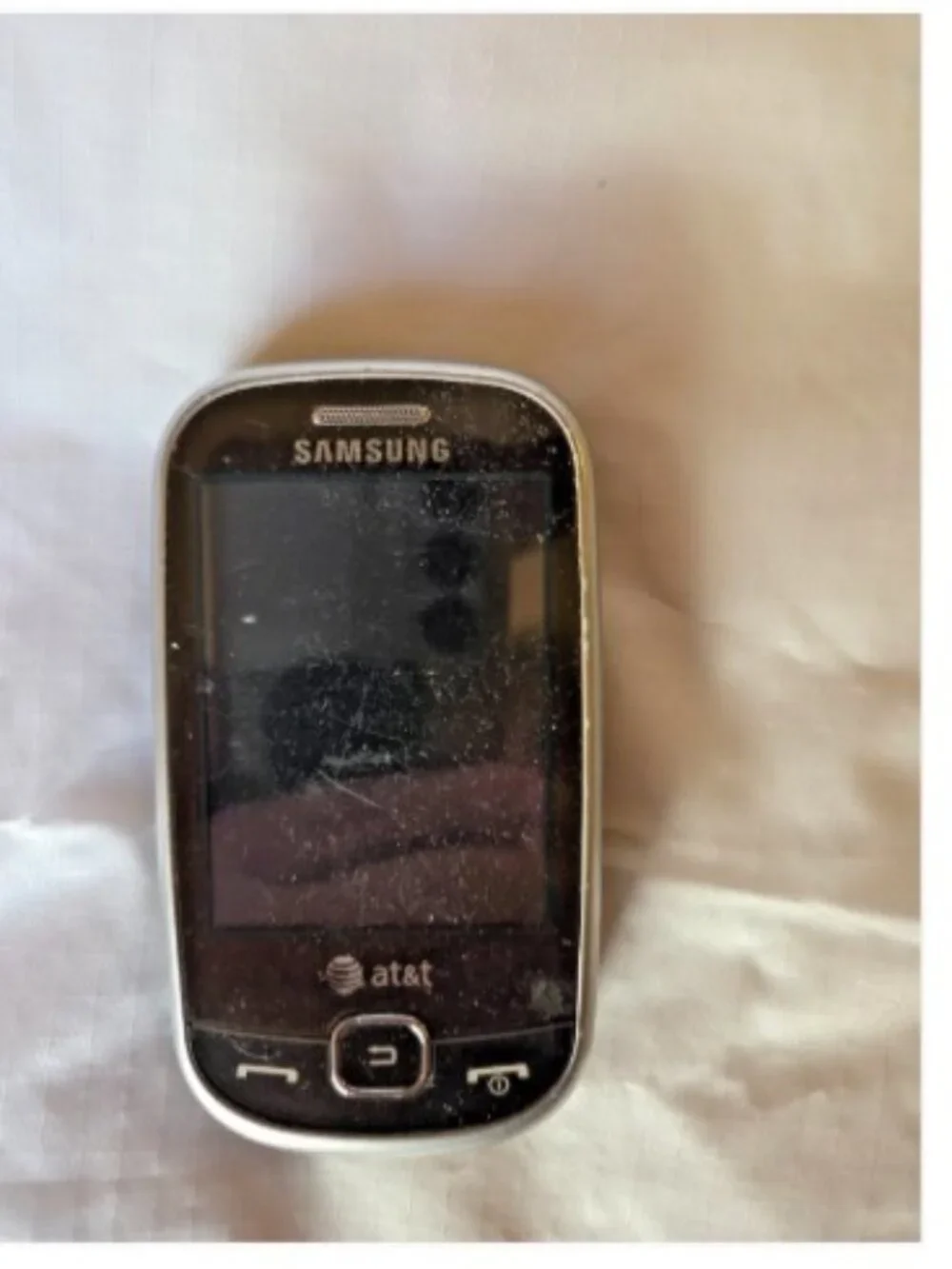 3 older cell phones-Nokia, Motorola, and Samsung